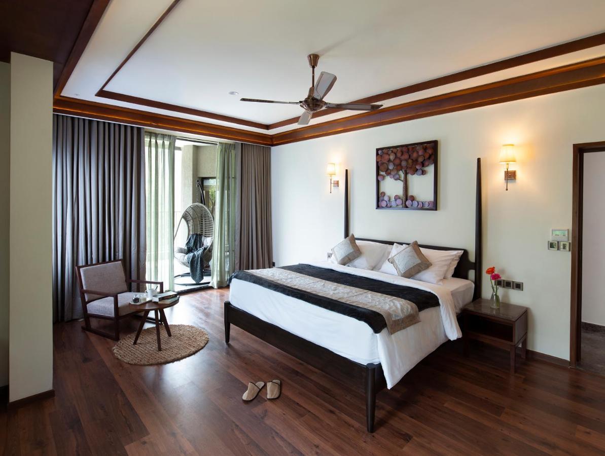 Niraamaya Retreats Samroha อทิราพาลลี ภายนอก รูปภาพ